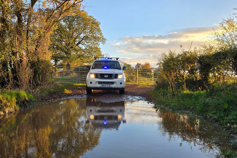 A 4x4 on a flooded plain