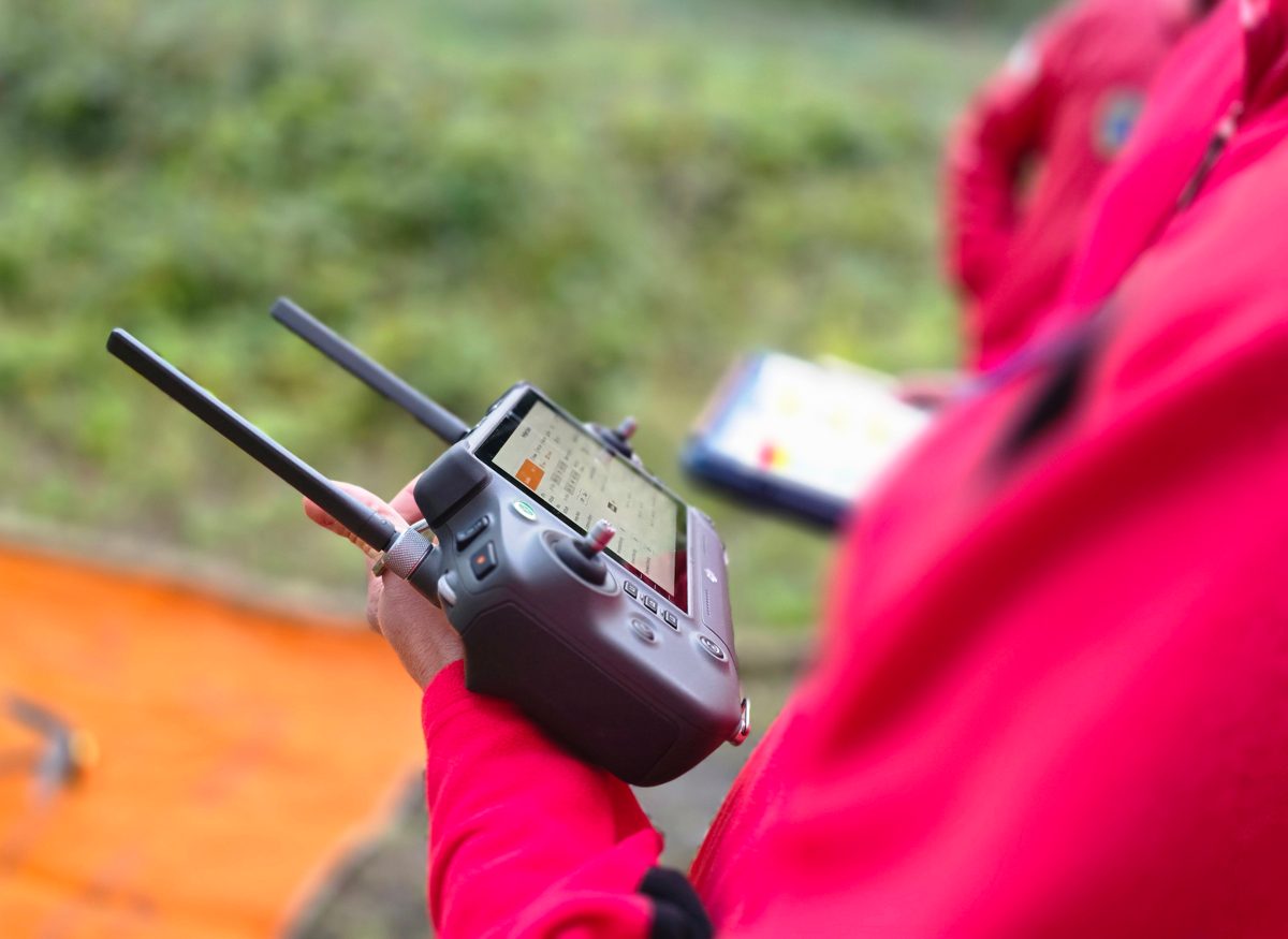 A WMSAR drone pilot at the controls during a search